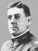 A vintage black-and-white portrait of Lieutenant Colonel Fred E. Smith in a military uniform.