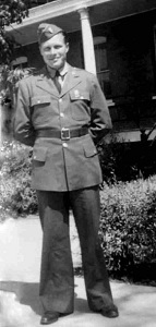 Captain James K Brewer in dress uniform standing photo