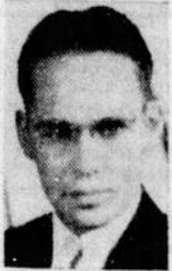 Private First Class Carl Berhart Wasness in civilian suite and tie head and shoulder photo