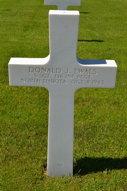 Staff Sergeant Donald J Ewals cross grave marker photo