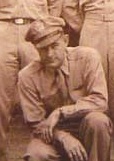 Second Lieutenant Donald L Bennett in uniform kneeling photo