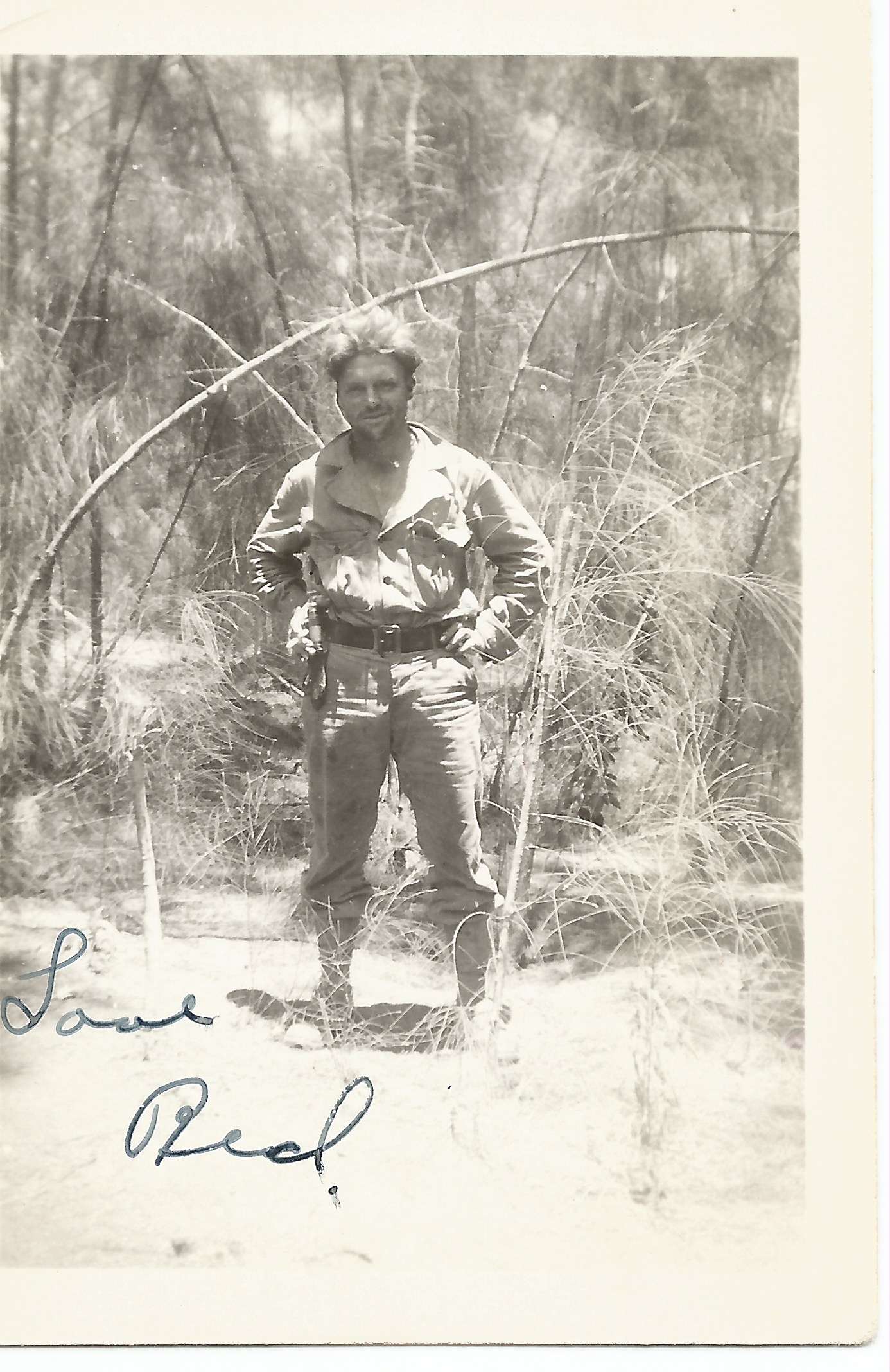 Photo of Private Francis J York in uniform standing outside