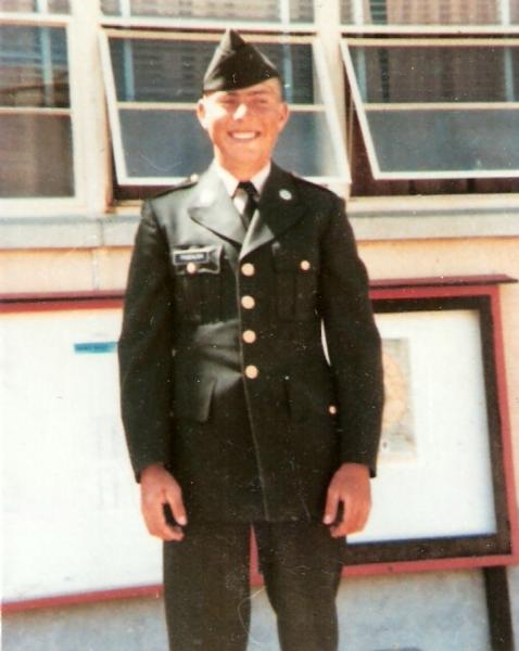 Norbert Froehlich photo shown standing outdoors in full formal military dress. 