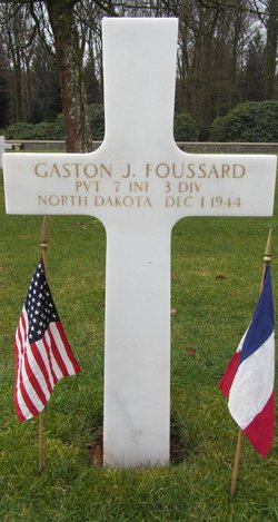 Private Gaston J Foussard cross grave marker with small flags photo