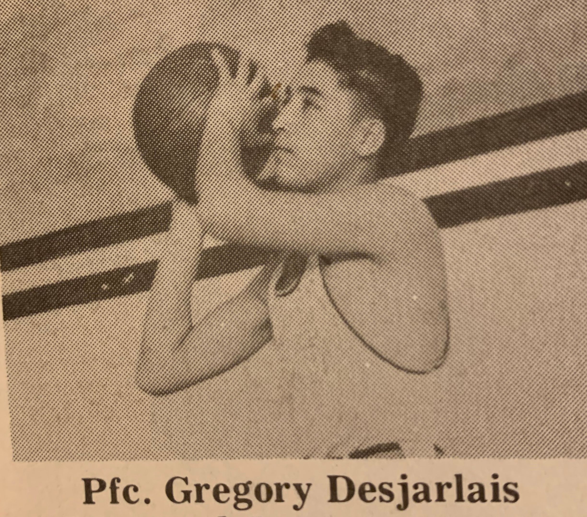 Private First Class Gregory R Des Jarlais playing basketball photo