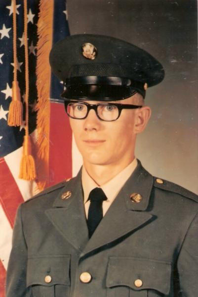 Specialist Fourth Class Lowell George Hardmeyer photo.  This is a formal military portrait.