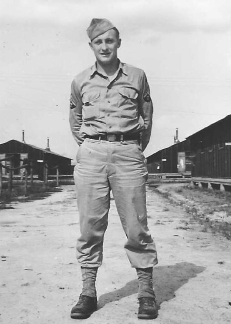 Technician Fourth Grade Harold Douglas Ellingson standing in uniform photo