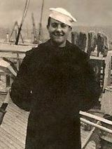 Electrician's Mate First Class Harris Larson in military uniform.