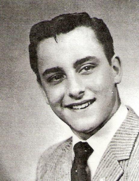 Robert Himler black and white photo dressed in civilian attire in a professional pose.