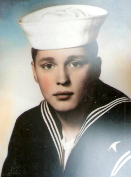 Michael Himmerick black and white photo.  He’s wearing the traditional enlisted dress uniform for the navy.