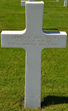 Private First Class James A Knutson cross grave marker photo