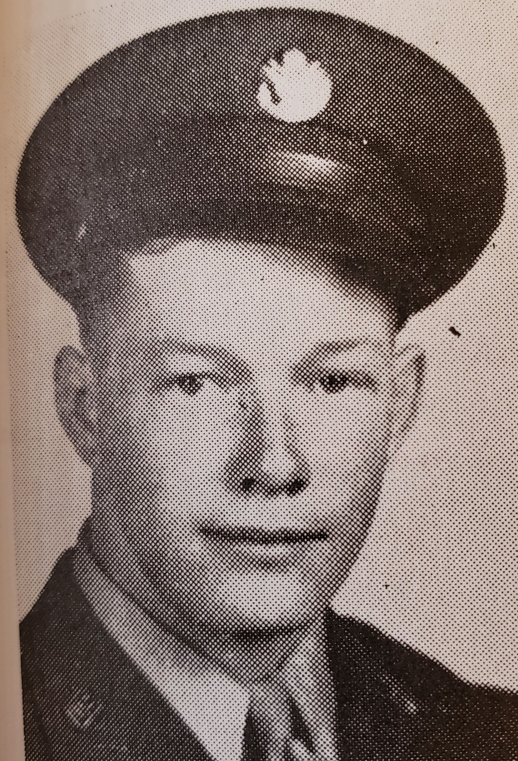 Private First Class John Herbert Einarson in uniform head and shoulders photo