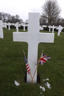 Private First Class John A Fadness cross grave marker photo