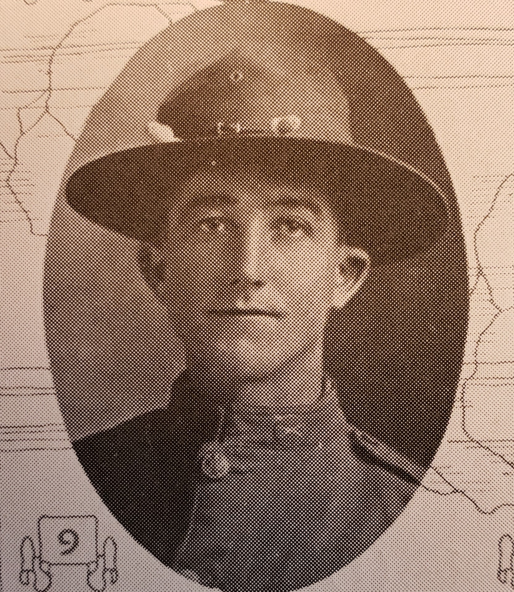 Vintage oval portrait of George J Lugert a World War I soldier wearing a Montana peak campaign hat.