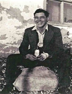 Private Charles J LaFrance in civilian clothes sitting photo