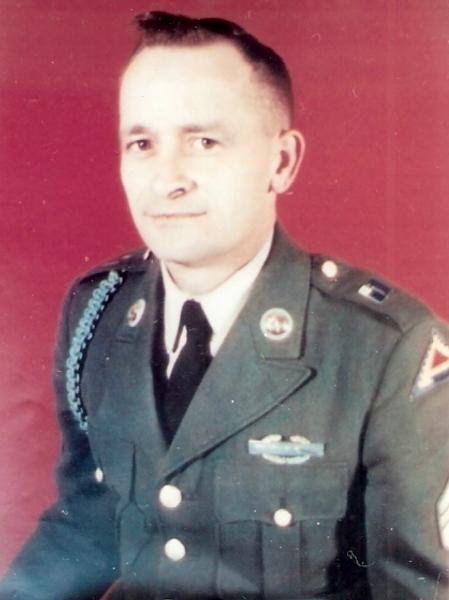 Herbert Lapp photo in military uniform in professional setting.