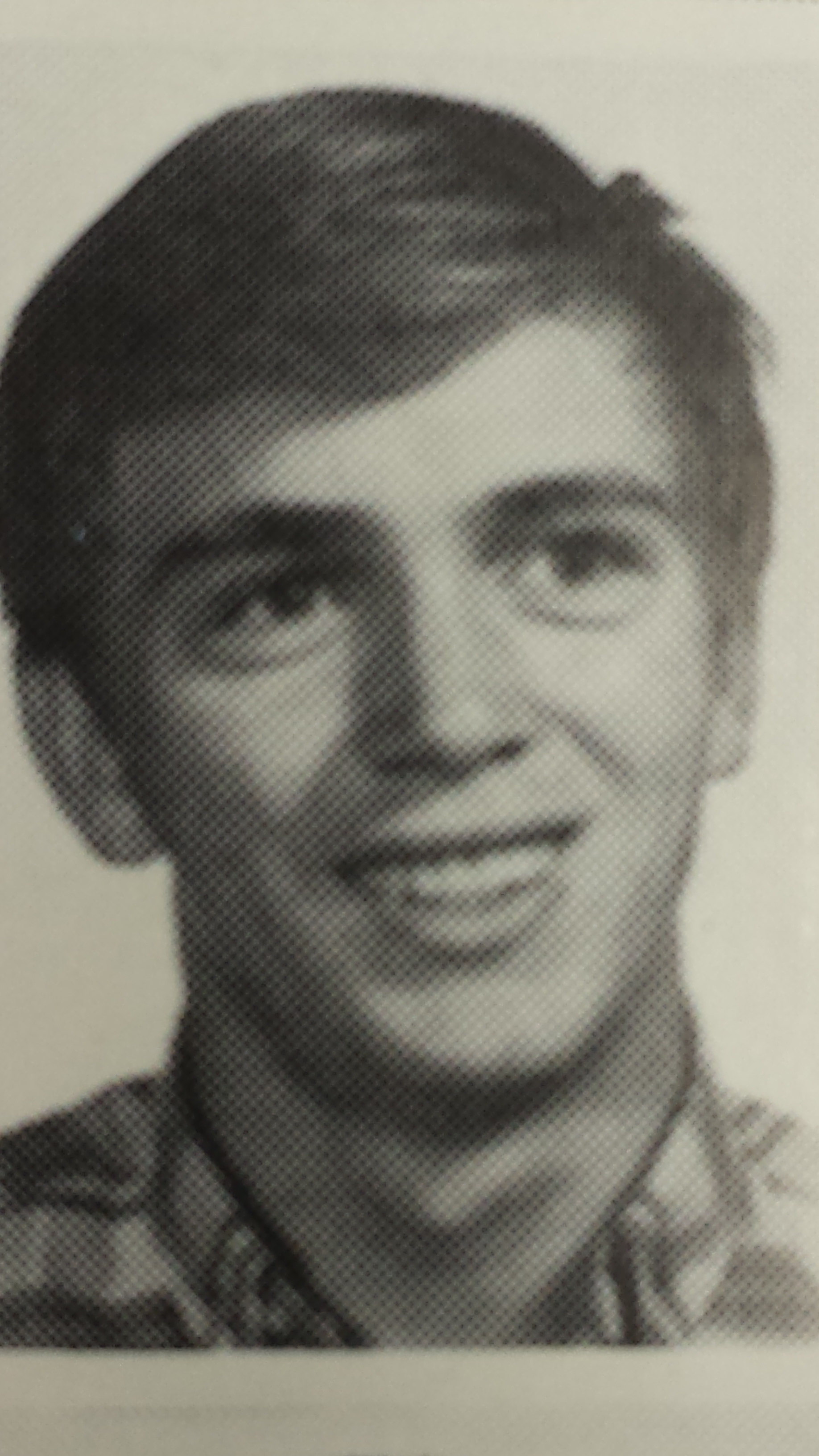 Richard Olson photo from what appears to be a newspaper wearing civilian clothes