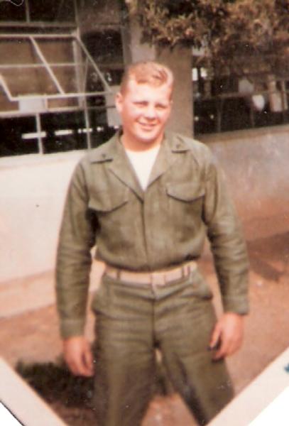 Photo of Richard Triske standing outside in duty uniform