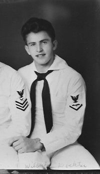 Aviation Radioman Third Class Wilbert W Dockter in uniform sitting photo