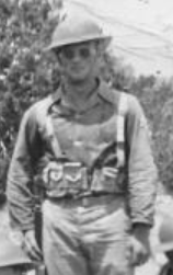 Staff Sergeant Andrew J Schaaf in uniform standing outside photo