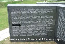 Boatswain's Mate First Petty Officer Arnt G Odegaard name inscribed on memorial wall with several other names photo