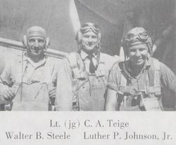 Lieutenant Junior Grade Clarence A Teige in uniform with two others in uniform standing in front of an airplane photo