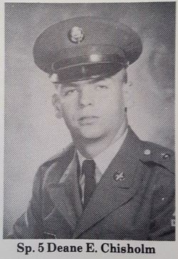 This is a black‑and‑white formal portrait of Specialist 5 Deane E. Chisholm, a U.S. Army enlisted specialist in the E‑5 pay grade.