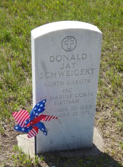 Photo of Donald Schweigert's grave marker.