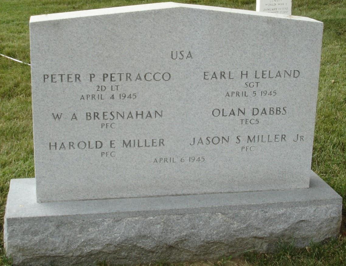 Sergeant Earl H Leland grave marker with several other names photo