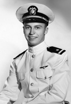 Lieutenant Junior Grade Edwin E Tuma in full dress uniform sitting photo
