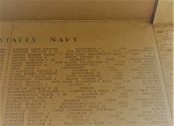Chief Commissaryman Emil Schadler's name on memorial wall with several other names photo