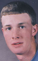 Dennis Ferderer looking towards camera slight smile