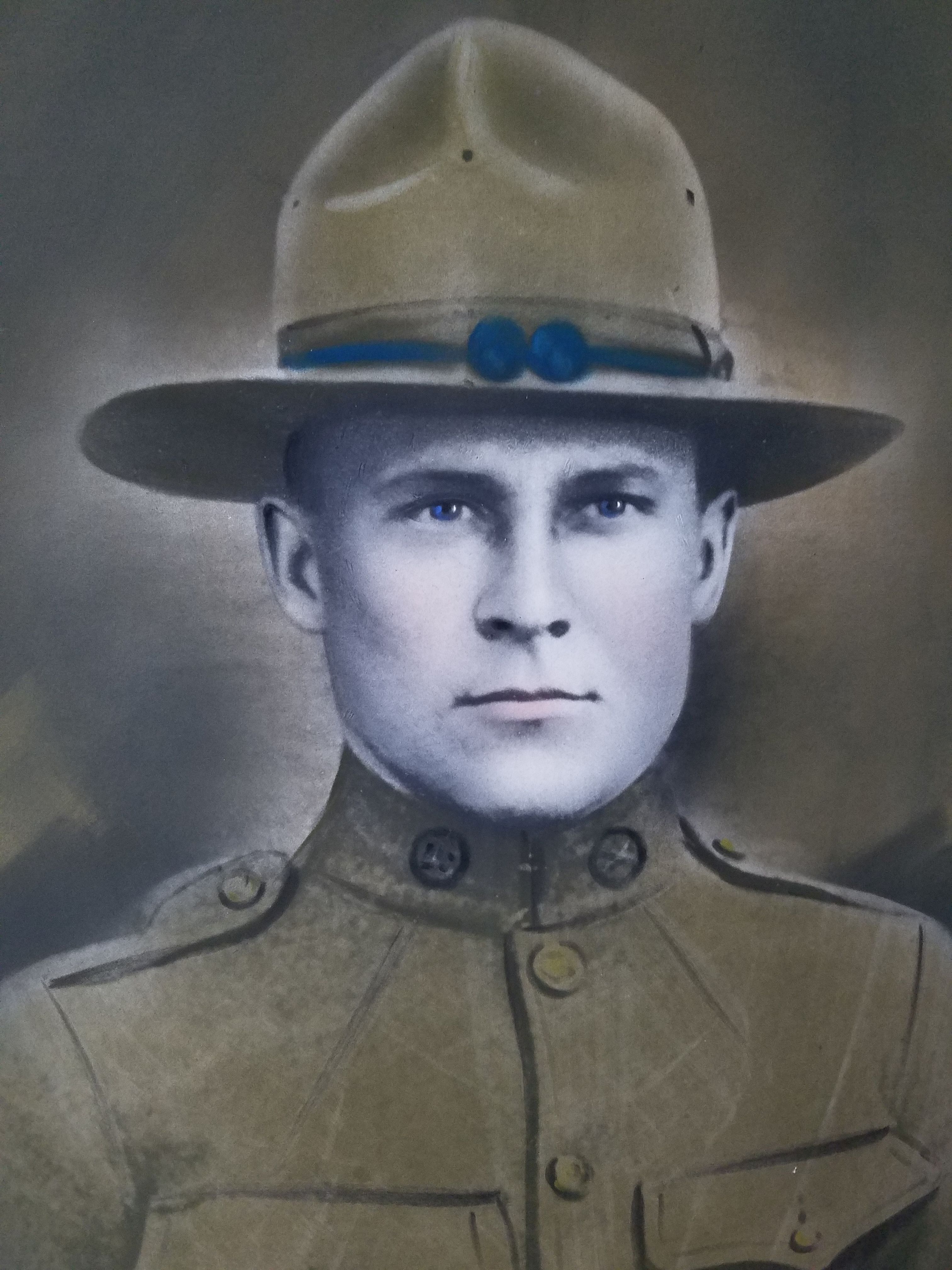 Vintage hand-colored portrait of Private Oscar Finkenhagen, a World War I soldier from North Dakota.