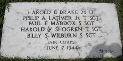 Technical Sergeant Harold V Shogren' name inscribe on memorial marker with four other names photo
