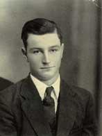 Private First Calss Herbert A McKitrick in civilian clothes suite and tie photo