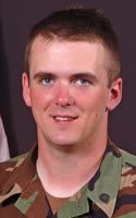 Michael Hermanson wearing a Battle Dress Uniform