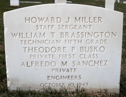 Staff Sergeant Howard J Miller's name inscribed with several others on stone photo