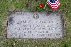 Private James J Tatarek grave marker with small American flag photo