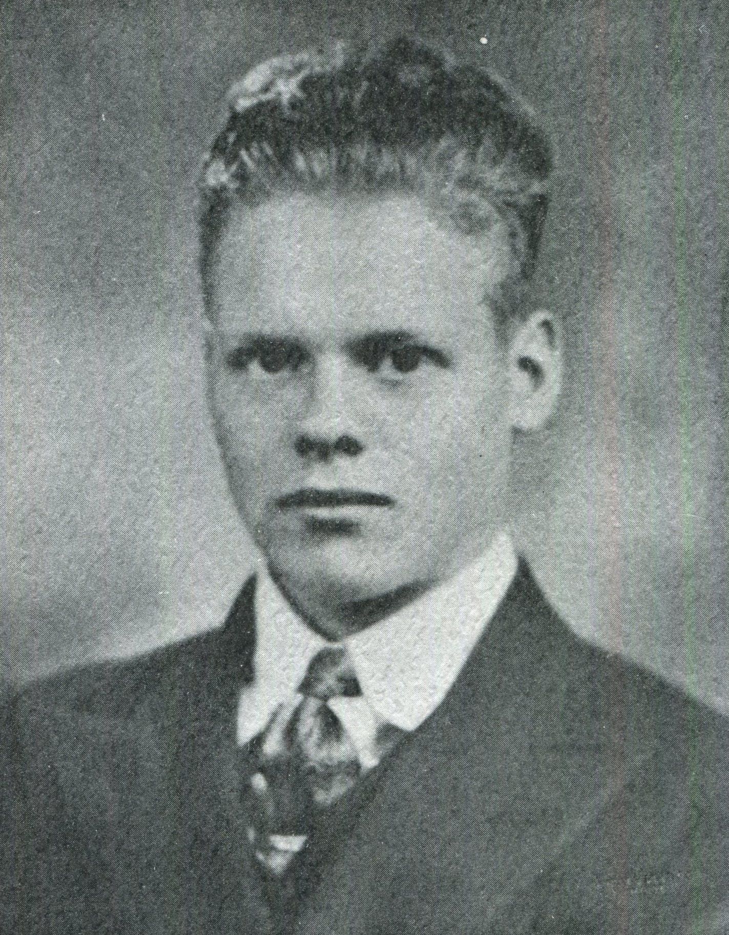 Private Leonard A Larson in civilian clothes head and shoulder photo