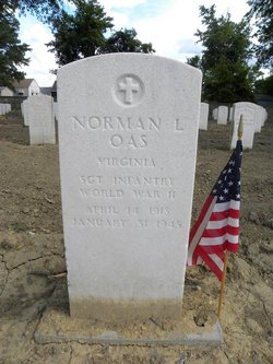 Sergeant Norman L Oas grave marker with small American Flag photo