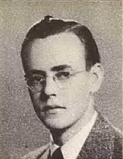 Private First Class Palmer O Swenson in civilian suite and tie head and shoulder photo