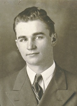 Staff Sergeant Stanley H Restemayer in suite and tie civilian clothes head and shoulder photo