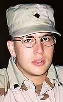 Thomas J. Sweet II wearing Army desert camouflage uniform.