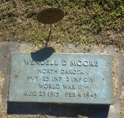 Private Wendell D Moore grave marker with bronze star photo