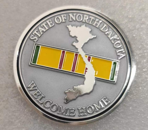 Front of welcome home coin